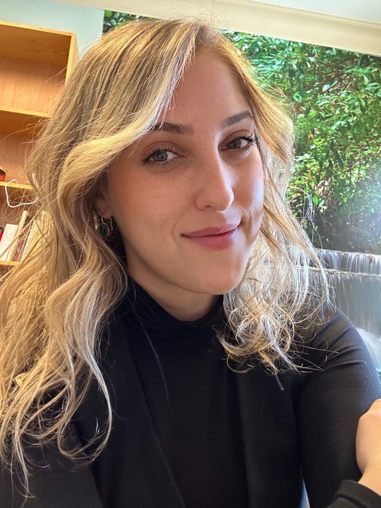 Headshot of smiling blond woman